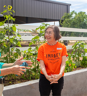 Volunteers Dig in at Equine-Therapy Farm by Planting, Weeding